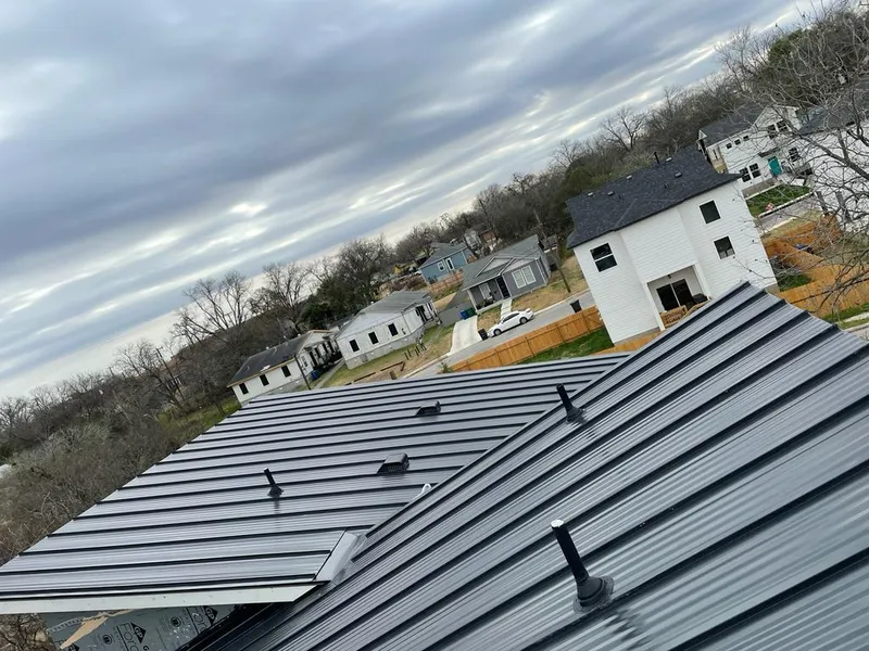 Standing seam metal roof panels with vents for Skylight Repair in Celina